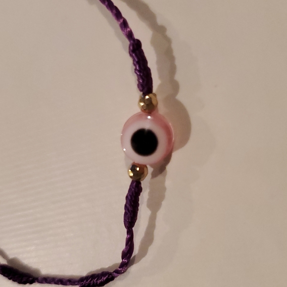 Pink Evil eye bracelet with purple string - Picture 2 of 2